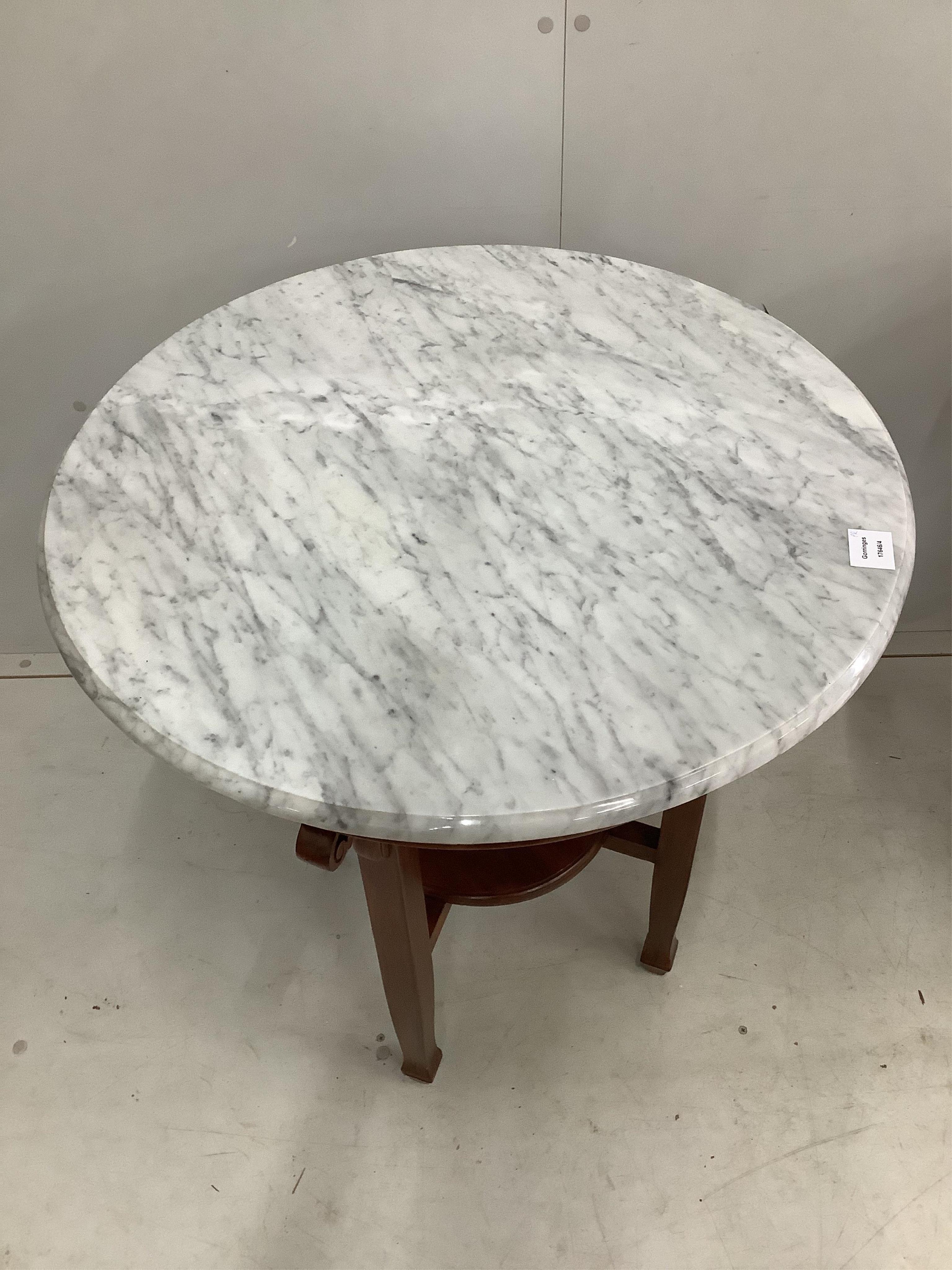A pair of Chinese Straits circular marble topped two tier mahogany centre tables, diameter 69cm, height 75cm. Condition - good